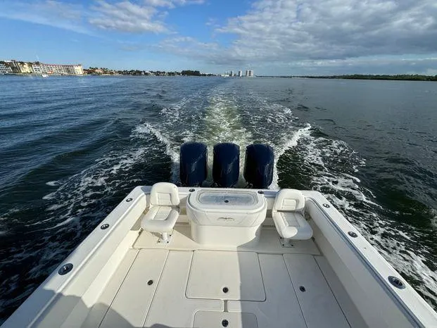 Killin Time II Yacht Photos Pics 2015 Invincible 39 Open Fisherman boat cruising on open water.
