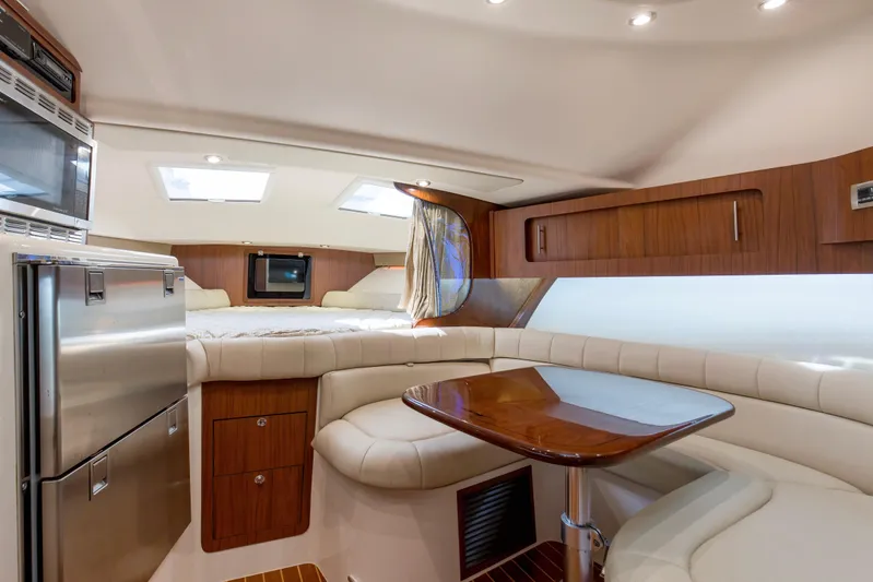 Papa's Dream Yacht Photos Pics Luxurious interior of 2016 Grady-White Express 370 boat with modern amenities and elegant design.