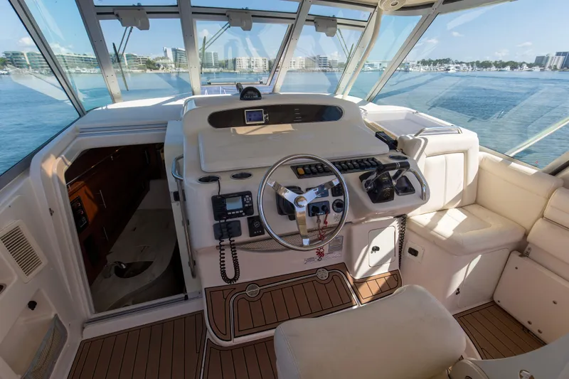 Papa's Dream Yacht Photos Pics Helm of 2016 Grady-White Express 370 boat with modern controls and ocean view.