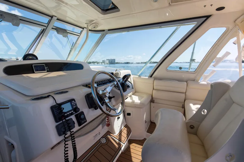 Papa's Dream Yacht Photos Pics 2016 Grady-White Express 370 boat interior with helm, steering wheel, and seating.
