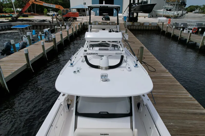 43 Everglades 435 Cc Yacht Photos Pics 2017 Everglades 435 Center Console boat docked at marina, aerial view.