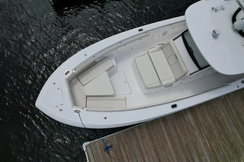 43 Everglades 435 Cc Yacht Photos Pics Overhead view of 2017 Everglades 435 Center Console boat docked by wooden pier.