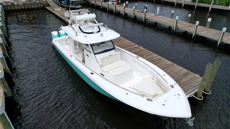 43 Everglades 435 Cc Yacht Photos Pics 2017 Everglades 435 Center Console boat docked at marina, aerial view.