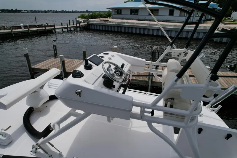 43 Everglades 435 Cc Yacht Photos Pics 2017 Everglades 435 Center Console boat docked by waterfront.