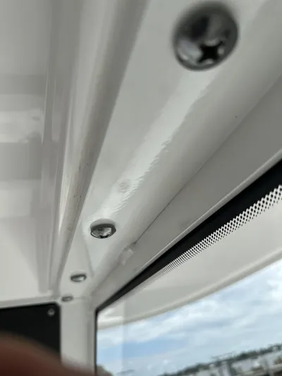 43 Everglades 435 Cc Yacht Photos Pics Close-up of Everglades 435 Center Console 2017 boat interior screws and window.