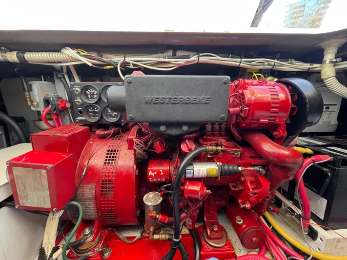 Rising Tide Yacht Photos Pics Engine compartment of a 1996 Sea Ray 400 Sedan Bridge with Westerbeke generator.