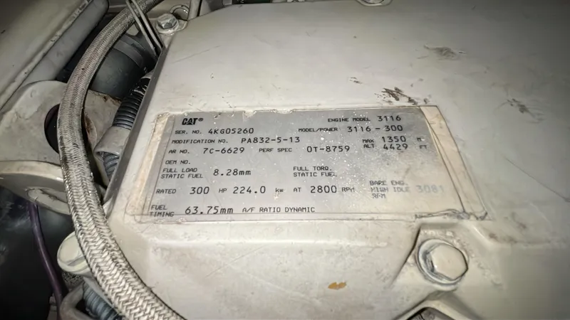 Rising Tide Yacht Photos Pics Engine specifications plate on a 1996 Sea Ray 400 Sedan Bridge.