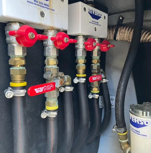 Rising Tide Yacht Photos Pics Engine compartment of a 1996 Sea Ray 400 Sedan Bridge with Reverso fuel system components.