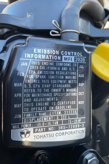 Rising Tide Yacht Photos Pics Emission control label on a 1996 Sea Ray 400 Sedan Bridge engine by Tohatsu Corporation.
