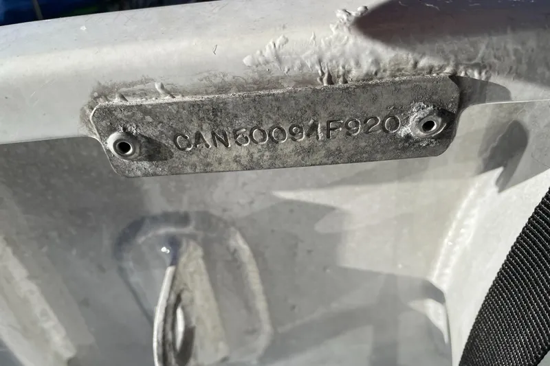 Rising Tide Yacht Photos Pics 1996 Sea Ray 400 Sedan Bridge hull identification number plate, showing "CAN80091F920".