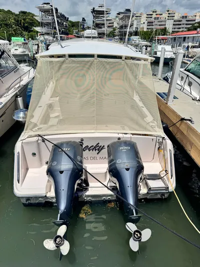  Yacht Photos Pics 2013 Grady-White Express 330 boat with twin outboard engines docked at marina.