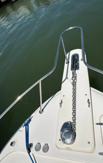 Yacht Photos Pics Bow of 2013 Grady-White Express 330 boat with anchor chain on calm water.