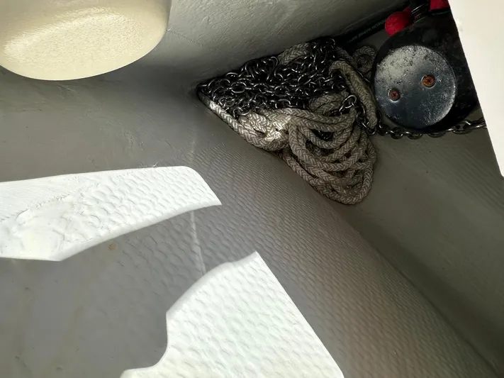  Yacht Photos Pics Anchor chain and rope storage on 2013 Grady-White Express 330 boat.