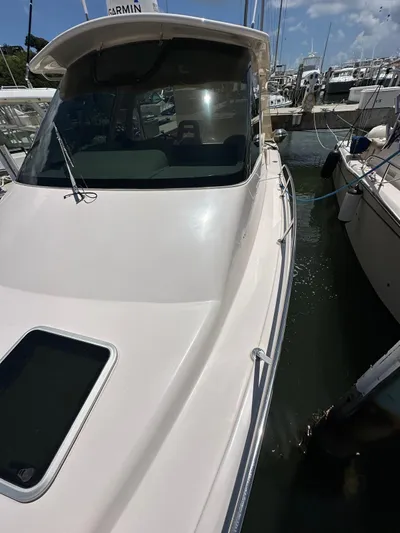  Yacht Photos Pics 2013 Grady-White Express 330 boat docked in marina, sunny day.