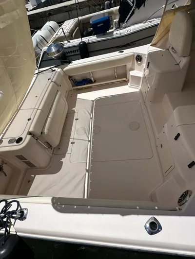  Yacht Photos Pics 2013 Grady-White Express 330 boat interior, spacious deck with seating and storage.