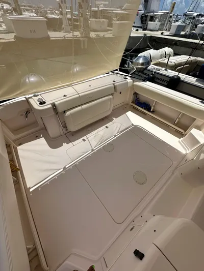  Yacht Photos Pics 2013 Grady-White Express 330 boat deck with seating and storage.