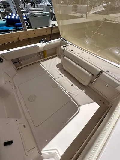  Yacht Photos Pics 2013 Grady-White Express 330 boat interior with spacious seating and storage.
