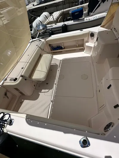  Yacht Photos Pics 2013 Grady-White Express 330 boat interior with seating and storage.