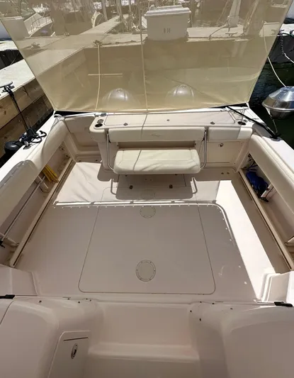  Yacht Photos Pics 2013 Grady-White Express 330 boat interior with seating and storage.