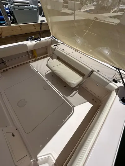  Yacht Photos Pics 2013 Grady-White Express 330 boat interior with seating and sunshade.
