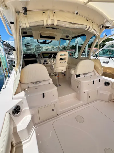 Yacht Photos Pics 2013 Grady-White Express 330 boat interior with seating and helm.
