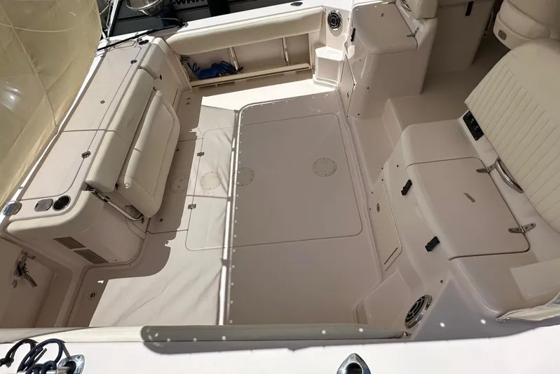  Yacht Photos Pics 2013 Grady-White Express 330 boat interior with spacious seating and storage.