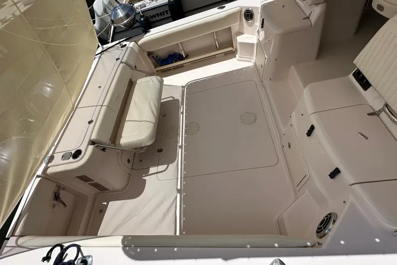  Yacht Photos Pics 2013 Grady-White Express 330 boat interior with seating and storage compartments.