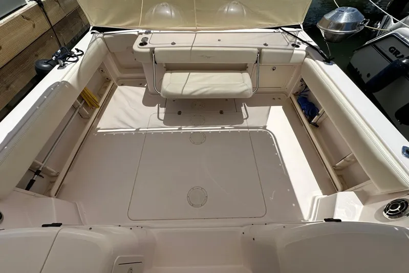  Yacht Photos Pics 2013 Grady-White Express 330 boat interior with spacious seating and storage.