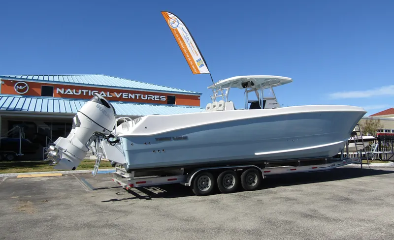  Yacht Photos Pics 2023 Twin Vee 340 GFX CC boat on trailer at Nautical Ventures dealership.