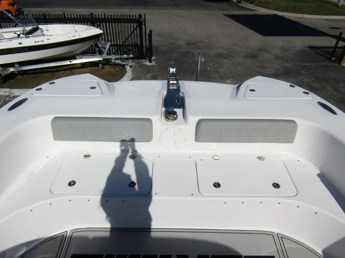  Yacht Photos Pics 2023 Twin Vee 340 GFX CC boat deck with storage compartments and anchor.