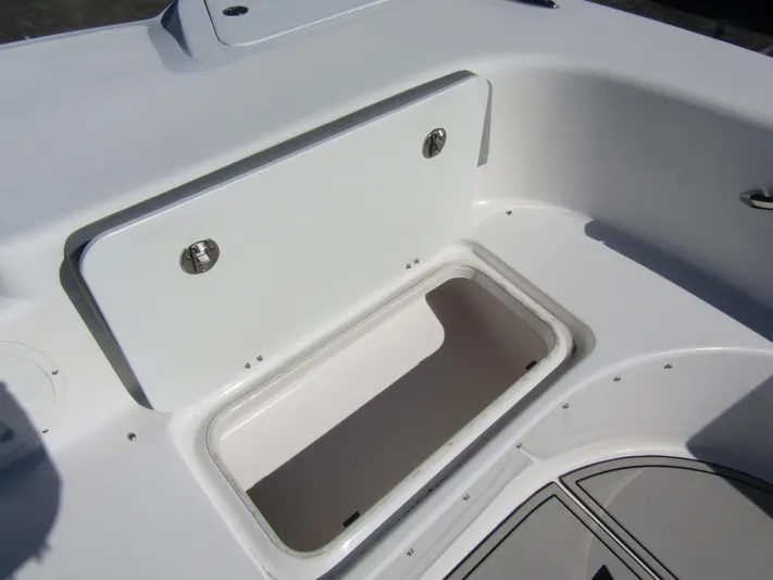  Yacht Photos Pics 2023 Twin Vee 340 GFX CC boat storage compartment, open and empty.