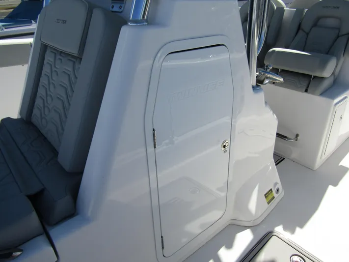  Yacht Photos Pics 2023 Twin Vee 340 GFX CC boat interior with sleek seating and storage compartment.