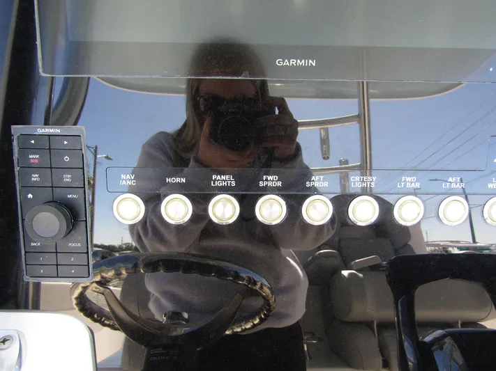  Yacht Photos Pics Dashboard of 2023 Twin Vee 340 GFX CC with Garmin controls and various switches.