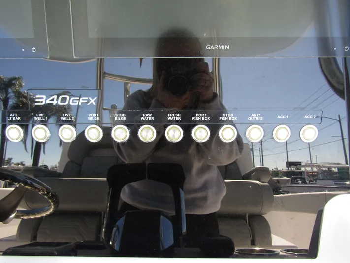  Yacht Photos Pics Control panel of 2023 Twin Vee 340 GFX CC boat with labeled switches.