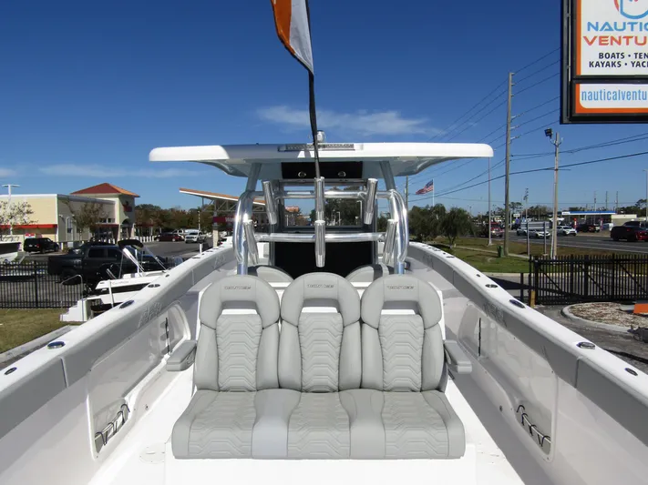  Yacht Photos Pics 2023 Twin Vee 340 GFX CC boat with sleek seating and modern design.