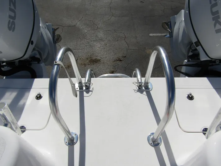  Yacht Photos Pics Twin Vee 340 GFX CC 2023 boat with dual Suzuki engines and stainless steel ladder.