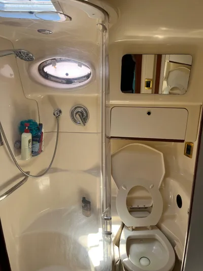  Yacht Photos Pics 1998 Sea Ray 450 Sundancer bathroom with shower and toilet.