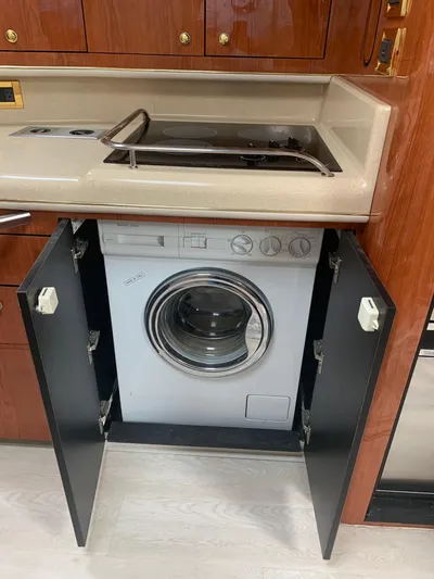  Yacht Photos Pics Washing machine in 1998 Sea Ray 450 Sundancer yacht kitchen cabinet.