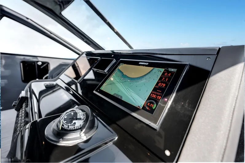  Yacht Photos Pics 2023 Cruisers Yachts 42 GLS OB dashboard with navigation display and compass.