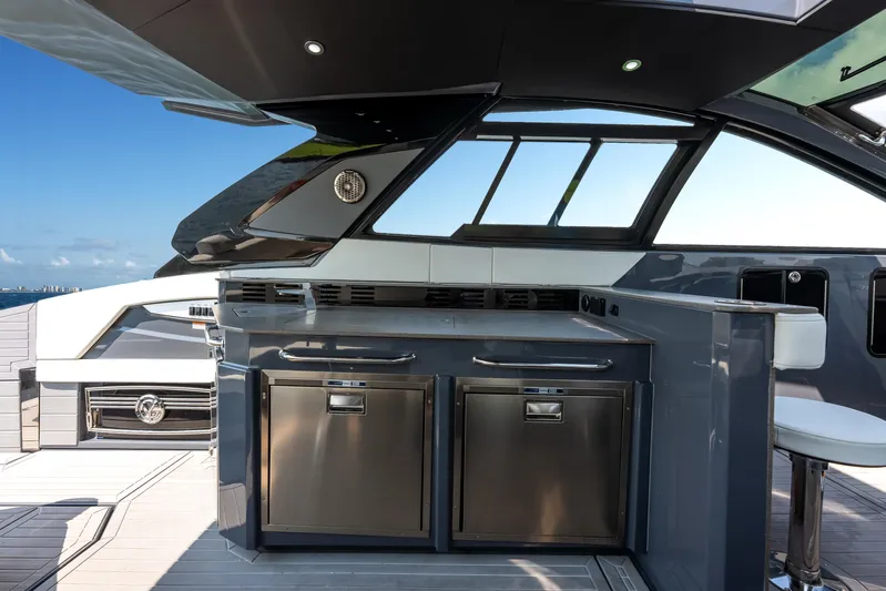  Yacht Photos Pics 2023 Cruisers Yachts 42 GLS OB interior with modern kitchen and sleek design.