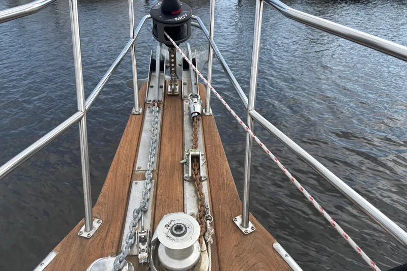 Starlight Yacht Photos Pics Bow of 1995 Island Packet 37 sailboat with anchor chain and winch.