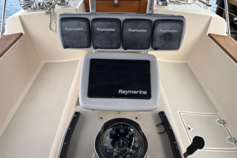 Starlight Yacht Photos Pics Cockpit of 1995 Island Packet 37 sailboat with Raymarine navigation equipment.