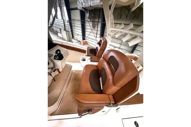  Yacht Photos Pics 2016 Scout 350 LXF boat interior with luxurious brown leather seating.
