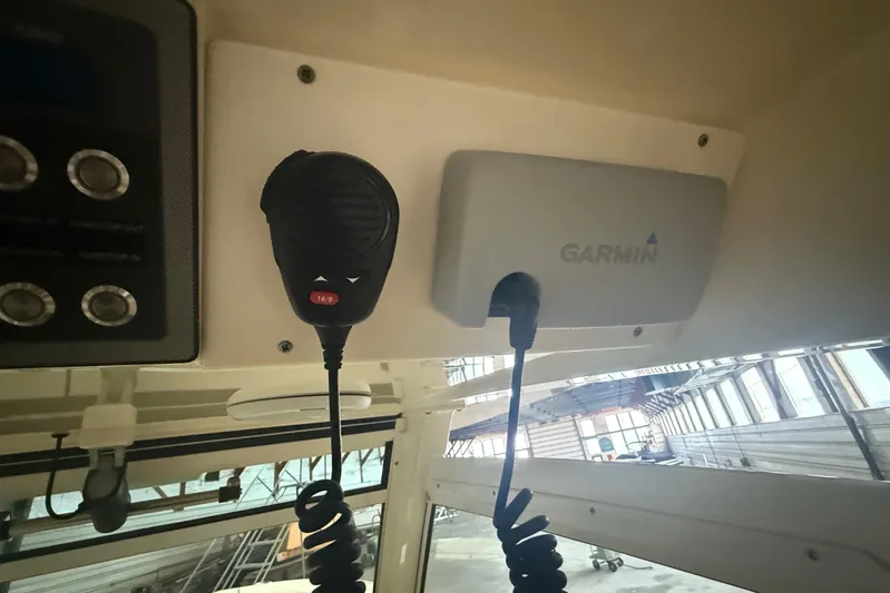  Yacht Photos Pics 2016 Scout 350 LXF boat interior with Garmin marine equipment and communication device.