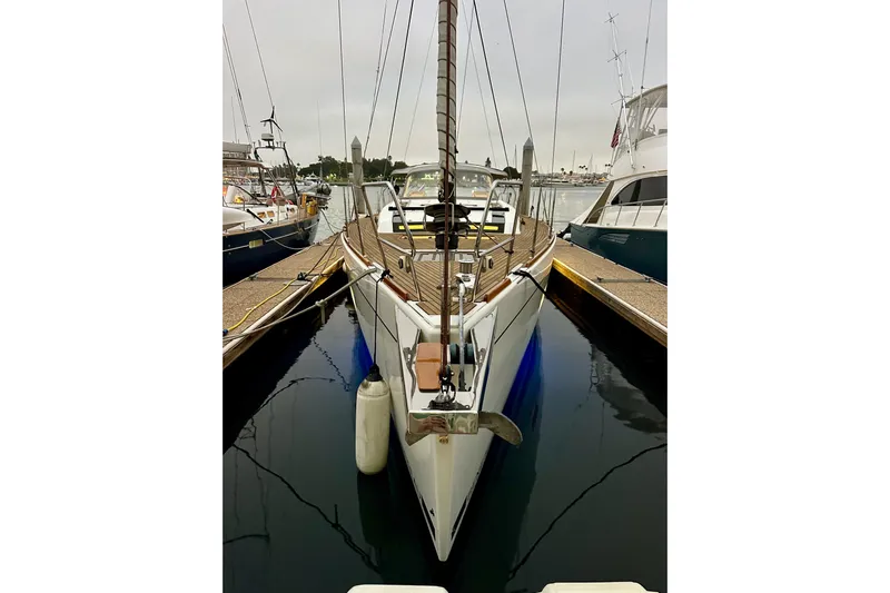 Champagne Yacht Photos Pics 2021 Beneteau Oceanis 55.1 yacht docked at marina, front view.