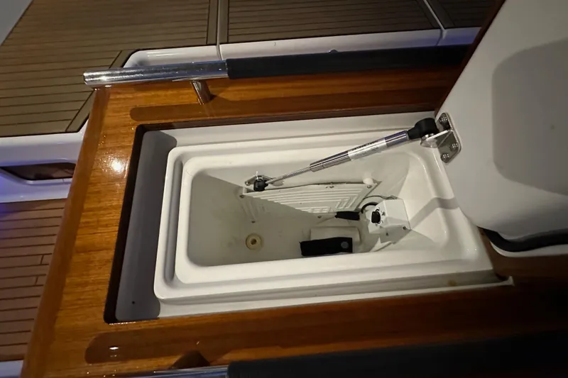Champagne Yacht Photos Pics Open storage compartment on 2021 Beneteau Oceanis 55.1 yacht deck.