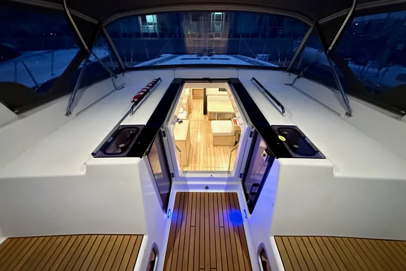 Champagne Yacht Photos Pics Beneteau Oceanis 55.1 yacht interior view, showcasing elegant wood flooring and modern design.