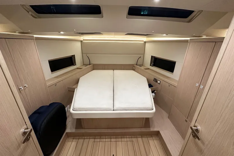 Champagne Yacht Photos Pics Luxurious interior cabin of 2021 Beneteau Oceanis 55.1 yacht with modern design.