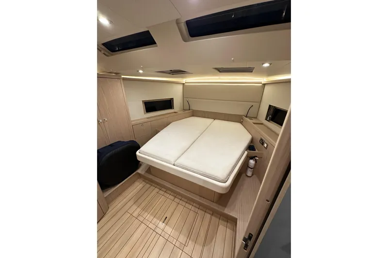 Champagne Yacht Photos Pics Luxurious interior cabin of 2021 Beneteau Oceanis 55.1 yacht with modern design.