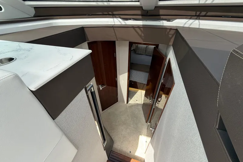  Yacht Photos Pics Interior view of 2022 Cruisers Yachts 50 Cantius, featuring modern design and luxurious finishes.